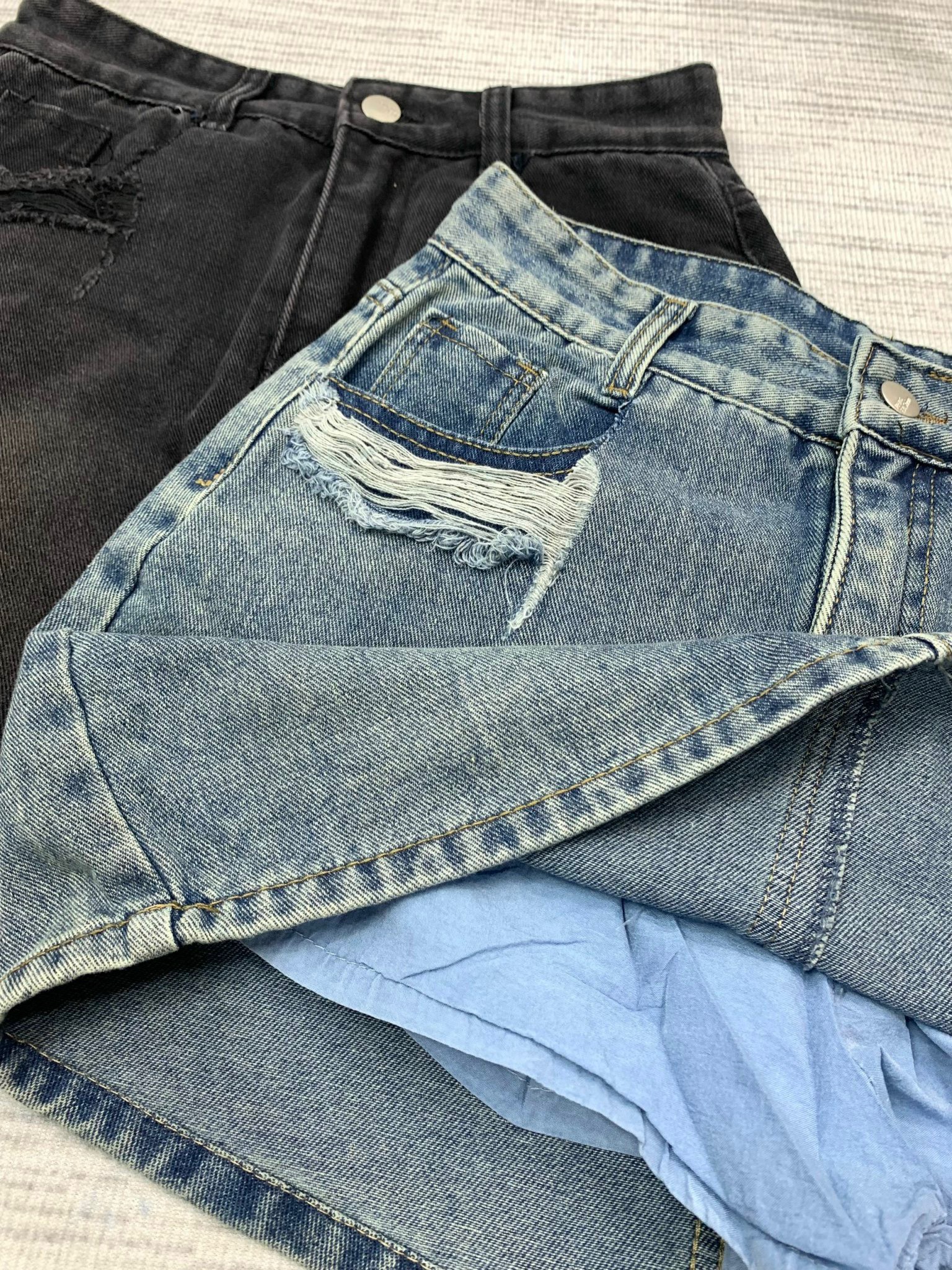 Chân váy jeans ngắn chữ A lưng cao túi rách tua rua phong cách cá tính có quần lót trong 7109